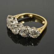 A large five stone diamond set half hoop ring, the centre stone spreads approx. 0.85 ct. the mount