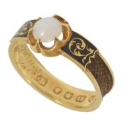 A Victorian gold and enamel mourning ring, circa 1850set with central circular opal between enamel