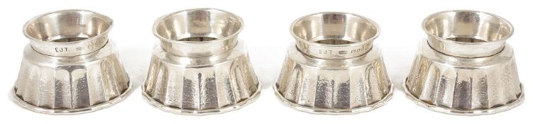 Four Harrow School of Art silver stackable egg holders/rings, London 1953each of flared form with
