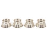 Four Harrow School of Art silver stackable egg holders/rings, London 1953each of flared form with