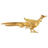 A 9ct gold pheasant broochhaving ruby set eye and naturalistic engraved feather detail, fully marked