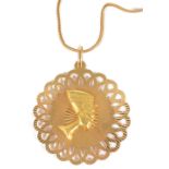 A large Continental 18ct gold 'Nefertiti' pendant on chainthe large pierced circular pendant applied