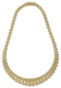 A ladies elegant graduated polished woven link 9ct gold necklacefully marked on push fastening