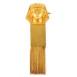 An Edwardian Egyptian Revival, gold 'Pharaoh Head' broochthe hollow brooch in high relief