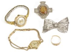 A Victorian Cairngorm citrine set silver plaid broochtogether with a large silver filigree ribbon