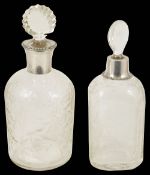 Two Edwardian glass decanters with silver collarseach with foliate engraved bodies and silver