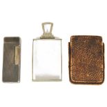 A Dunhill silver plated lighter and a white metal mounted magnifying glassthe magnifying glass of