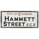A City of London vitrolite opal glass street sign from Hammett Street E.C.3, circa 1936Hammett