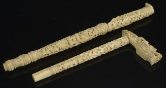 A 19th century Chinese Canton carved ivory parasol handlethe handle well carved of a dragons head,