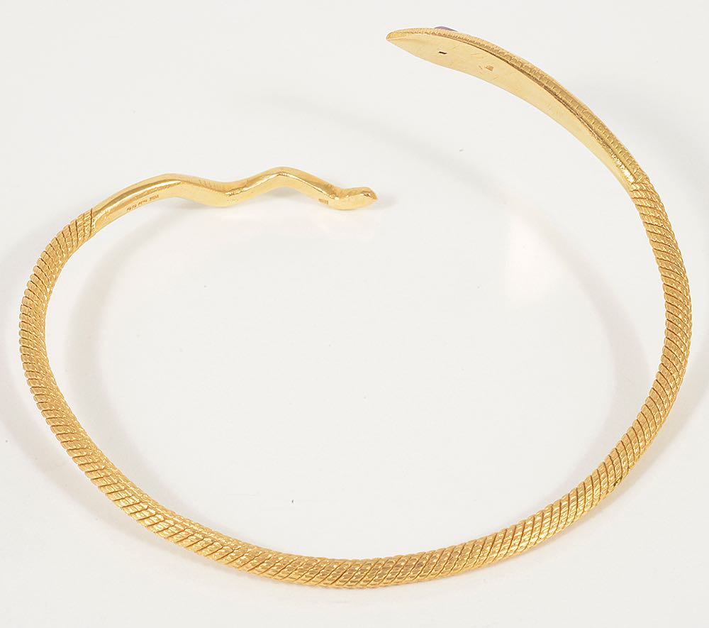 A contemporary 18ct gold woven snake banglethe serpent's head set with a single tear shaped cabochon - Image 2 of 2