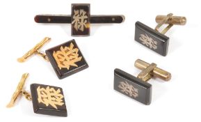 A pair of Chinese Edwardian gold and tortoiseshell cufflinkstest for gold, marks rubbed, the