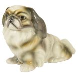 An Austrian Goldscheider King Charles Spaniel figurine, modelled seated on its hind legs, factory