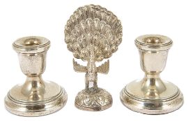 A pair of silver miniature squat taper candlesticks, Birmingham 1996 & 1997of squat form with filled