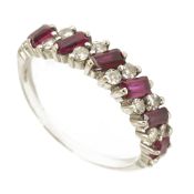 A rubellite and diamond set half eternity ringthe white metal mount marked 18ct, with six baguette