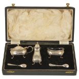 A cased Mappin & Webb silver cruet suite, Birmingham 1960,a lidded mustard pot with blue glass liner