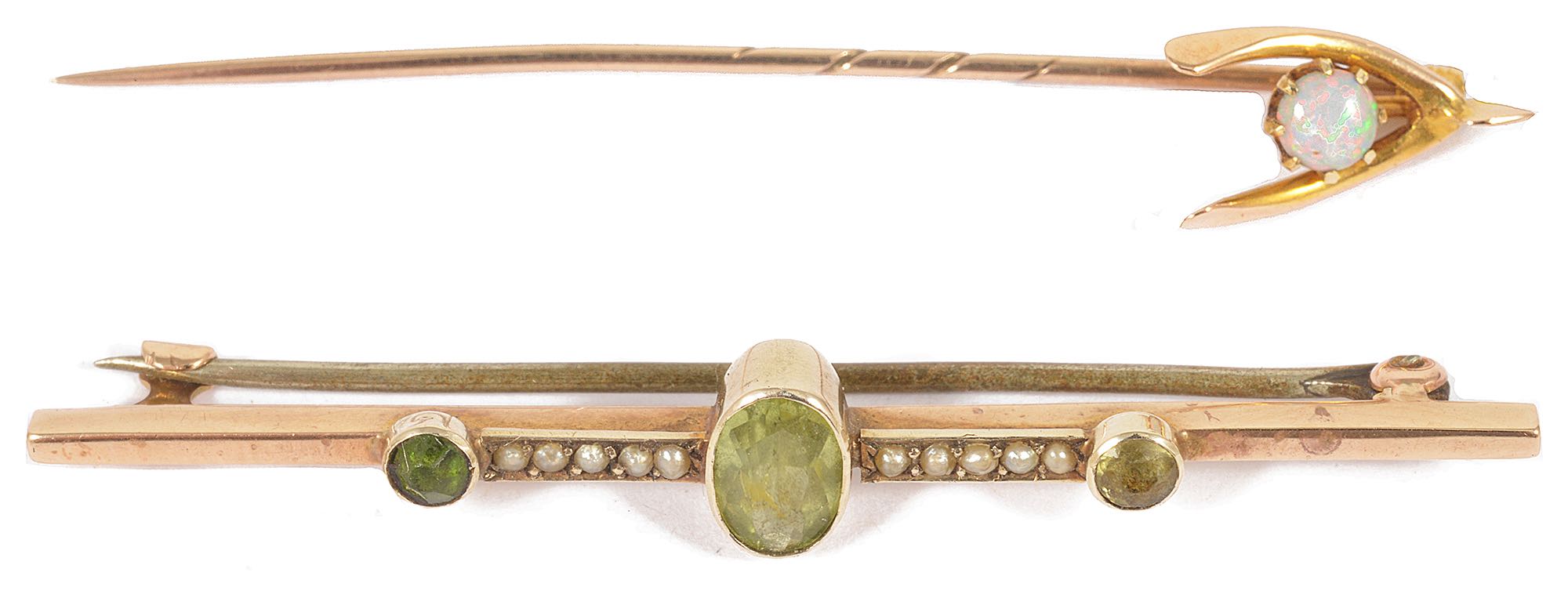 An Edwardian opal set 'wishbone' stick pintogether with a 9ct gold seed pearl and peridot bar