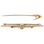 An Edwardian opal set 'wishbone' stick pintogether with a 9ct gold seed pearl and peridot bar