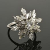 A large Continental diamond set 'snowflake' cluster ringthe central stone approximately 1.00 ct