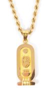 A Continental Egyptian gold hieroglyphic pendant on chainthe pendant of two colours, tests for