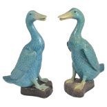 A pair of Chinese porcelain figures of geese, 20th centuryboth in a turquoise glaze realistically