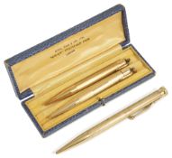 A 9ct gold pencil and two Mabie Todd Fyne Paynt pencilsthe 9ct gold pencil with engine turned