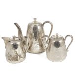 A Chinese export silver three piece tea set, early 20th century