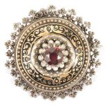 A late 19th Century Austro-Hungarian garnet and enamel broochthe circular target brooch raised