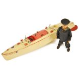 A Meccano Hornby Speedboat Racer IIIwith cream body and red trim, no key, factory label on body,