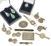 A collection of Chinese and Eastern silver jewelleryto include cufflinks, tie pins, brooches, a