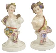 A pair of Continental porcelain busts, late 19th/early 20th century,modelled as a female with flower