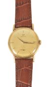 An Omega 14K gold gentleman's wristwatchthe circular champagne coloured dial with baton hours with