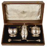 A George V three piece silver cruet suite, Birmingham 1917,comprising pepperette, salt and