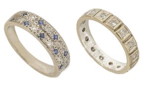 A contemporary diamond set full eternity ring, each diamond set in square section mount, together