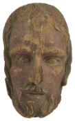 A 19th century wooden carved and painted figurehead of a bearded male