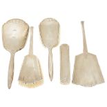 Five Art Deco silver dressing table brushes/mirrors, Birmingham 1932comprising two brushes and a