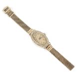 An Edwardian ladies platinum and diamond cocktail wristwatch, the oval dial with arabic hours and