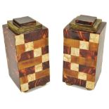 A pair of faux tortoiseshell veneered garniture square section columns
