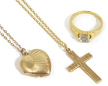 A contemporary 18ct gold mounted single stone dress ring together with a 9ct gold pendant cross on