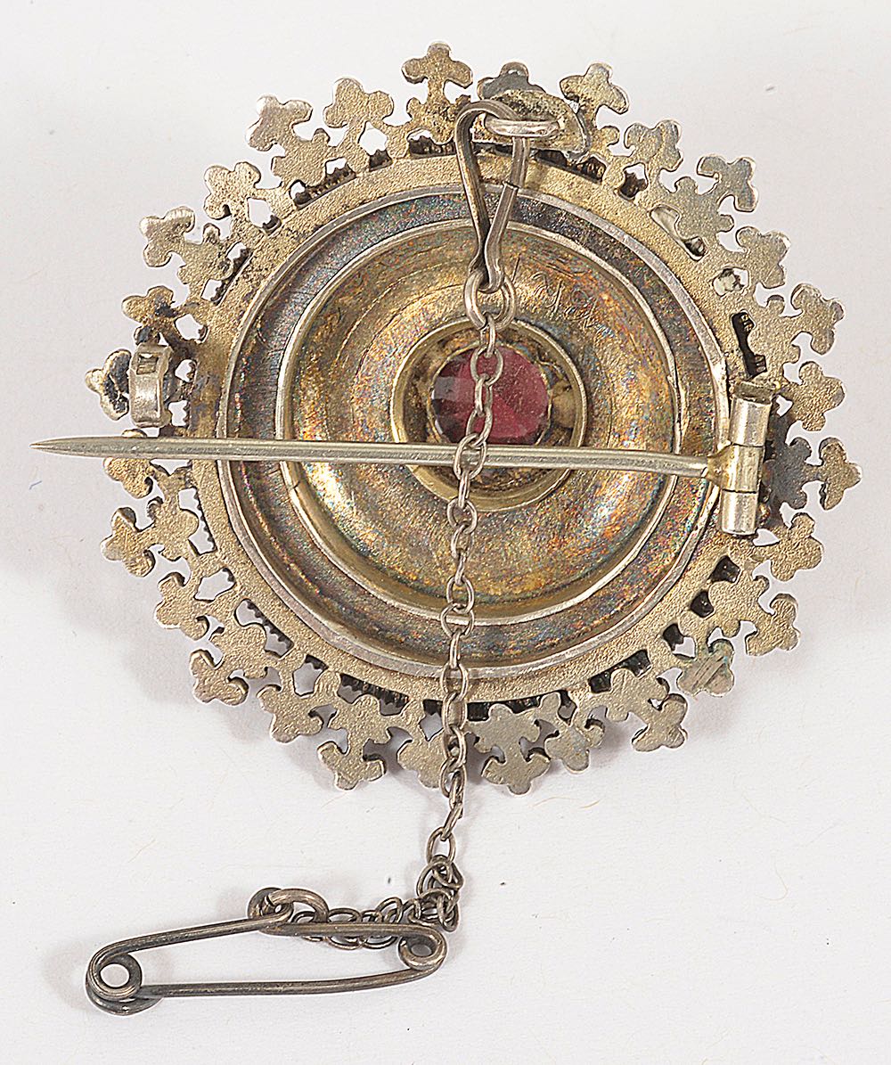 A late 19th Century Austro-Hungarian garnet and enamel broochthe circular target brooch raised - Image 2 of 2
