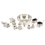A collection of assorted silver plated cruets and bowlcomprising two hinge lidded mustard containers