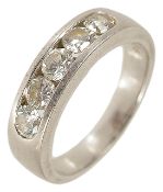 A Continental five stone diamond set half eternity ring