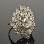 A large pear shaped diamond set fancy cocktail cluster ring