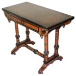 A Victorian ebonised and walnut fold over card table