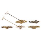 A collection of five Victorian brooches,