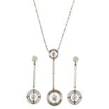 A stylish Art Deco diamond set pendant necklace and matching eardrops