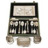 A collection of cased silver cutlery and napkin rings