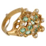 An unusual modernist design emerald and diamond set cocktail ring,