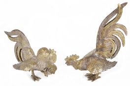 A pair of Continental cast silver and silver gilt fighting cocks, London import mark for 1973