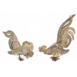 A pair of Continental cast silver and silver gilt fighting cocks, London import mark for 1973