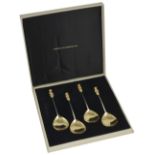 A set of contemporary four silver and silver gilt seal top apostle spoons, hallmarked London 1972